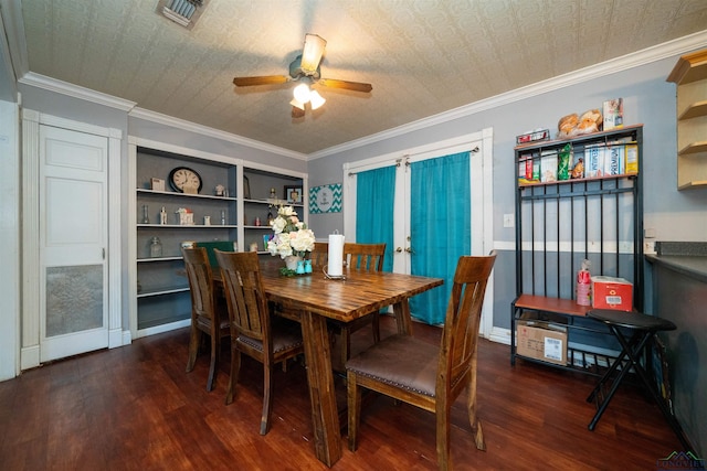 dining space with built in shelves, ceiling fan, ornamental molding, and dark hardwood / wood-style floors