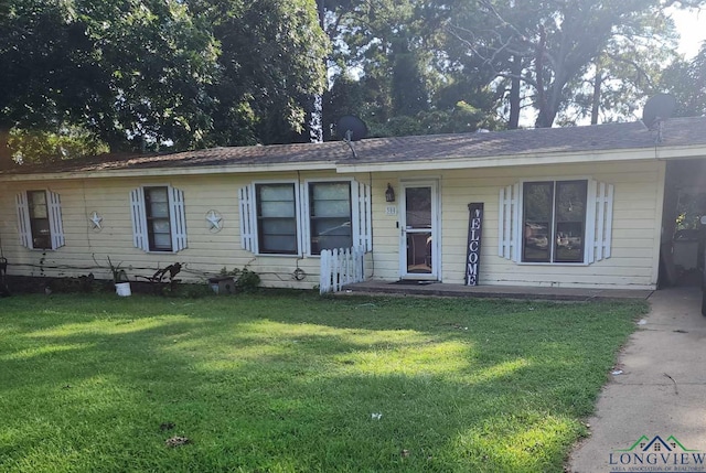 ranch-style house with a front yard