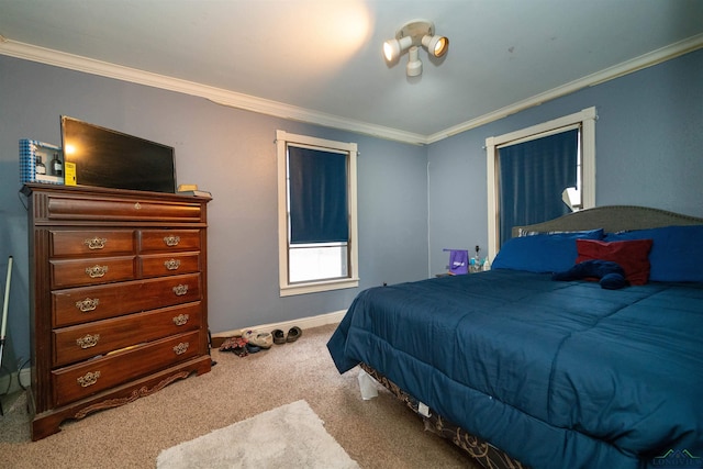 carpeted bedroom featuring crown molding