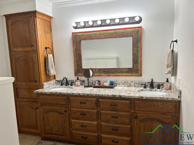 1203 Tiffany Ln, Longview, TX 75604 - bathroom with double vanity, tile patterned flooring, and ornamental molding