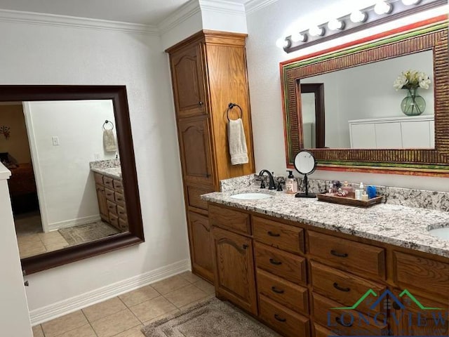 1203 Tiffany Ln, Longview, TX 75604 - bathroom with double vanity, tile patterned floors, and crown molding