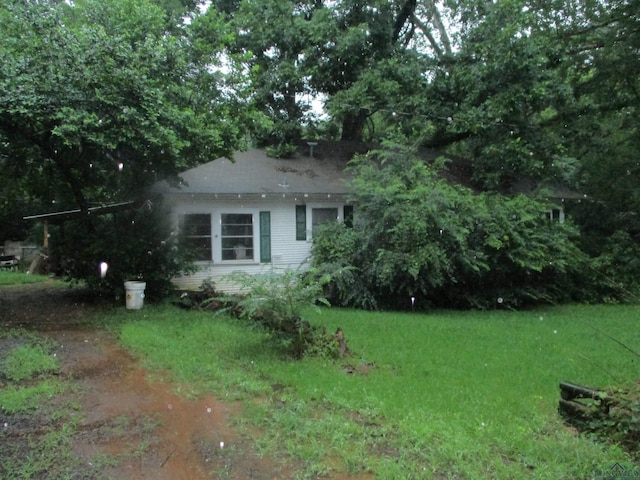 125 Wood St, Rusk, TX 75785 - view of side of property featuring a yard