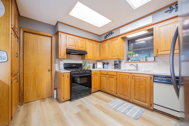 kitchen with black gas range, white dishwasher, sink, light hardwood / wood-style flooring, and ornamental molding