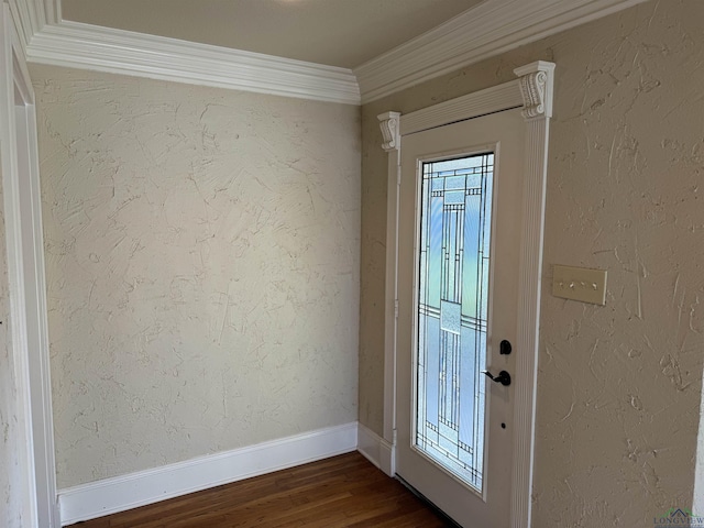 entryway with ornamental molding and dark wood-type flooring