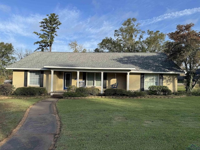 ranch-style home with a front yard