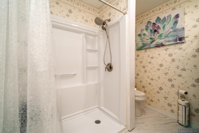 bathroom with toilet and walk in shower