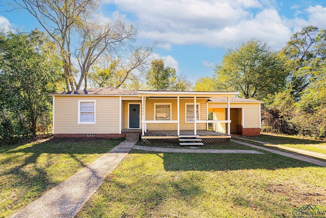 view of front of house featuring a front yard and a porch