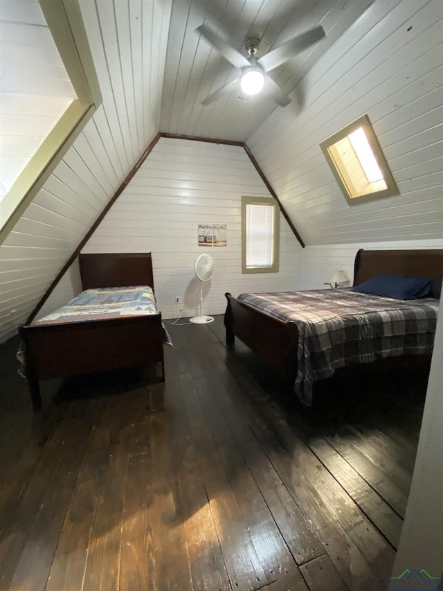 bedroom with lofted ceiling, wood ceiling, ceiling fan, and dark wood-style flooring