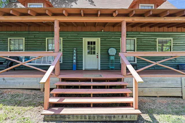 111 Inwood St, Avinger, TX 75630 - property entrance with a porch