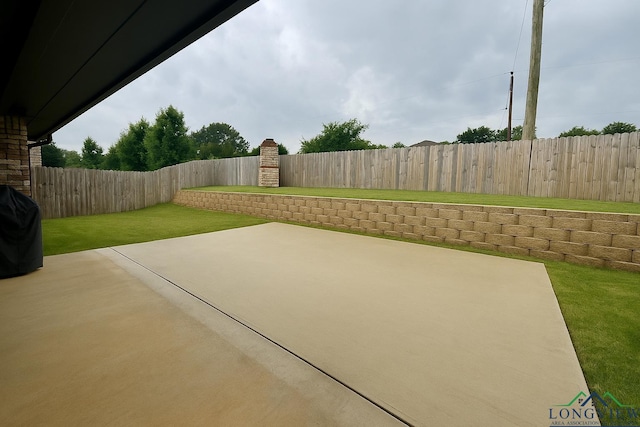 view of patio with a fenced backyard