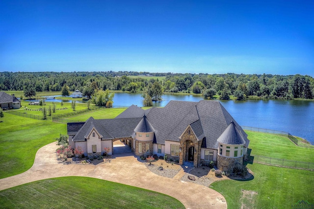 drone / aerial view with a water view