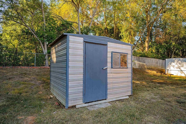 view of outdoor structure with a yard