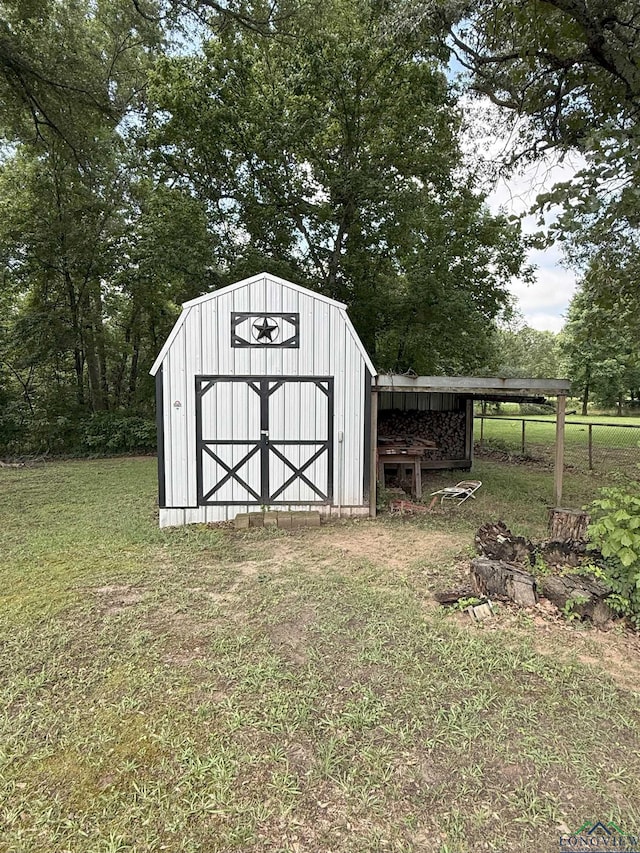 6479 W Fm 1252 W, Gladewater, TX 75647 - view of shed with view of wooded area