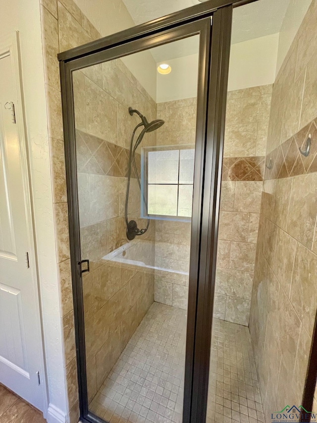 bathroom featuring walk in shower