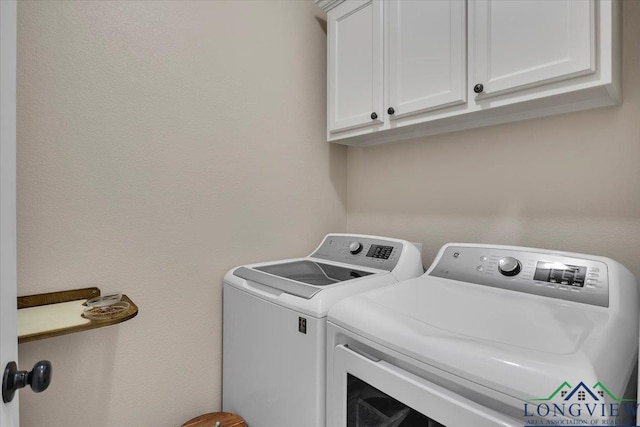 204 Nolan Farms, Winona, TX 75792 - washroom featuring washer and dryer and cabinets