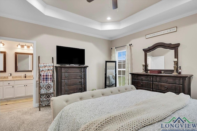 204 Nolan Farms, Winona, TX 75792 - bedroom featuring a raised ceiling, connected bathroom, and ornamental molding