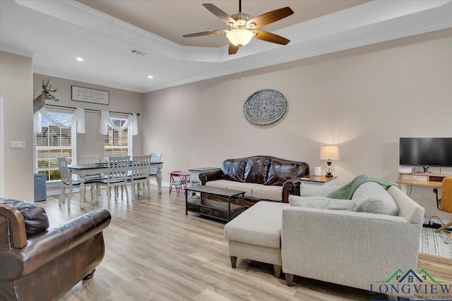 204 Nolan Farms, Winona, TX 75792 - living room with a tray ceiling, light hardwood / wood-style flooring, crown molding, and ceiling fan