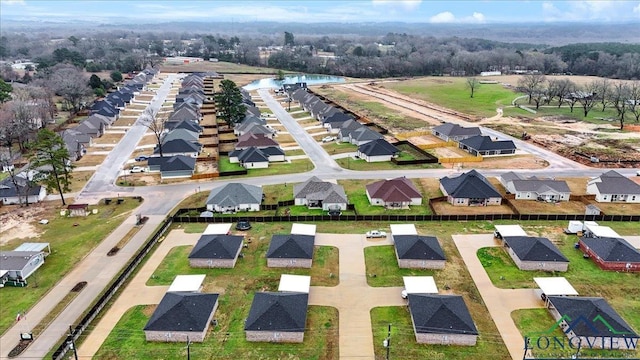 204 Nolan Farms, Winona, TX 75792 - drone / aerial view featuring a water view