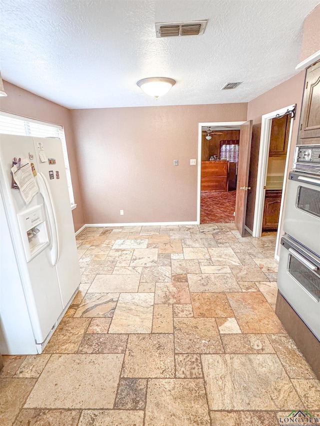 300 Delwood Dr, Longview, TX 75605 - interior space with visible vents and stone tile flooring