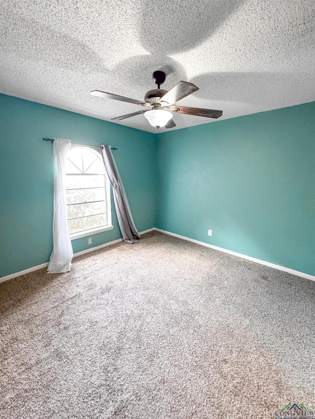 300 Delwood Dr, Longview, TX 75605 - carpeted spare room featuring baseboards and ceiling fan