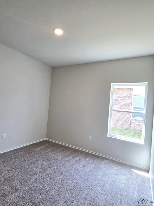 view of carpeted spare room