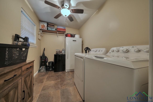 laundry area featuring washer and clothes dryer, cabinets, and ceiling fan