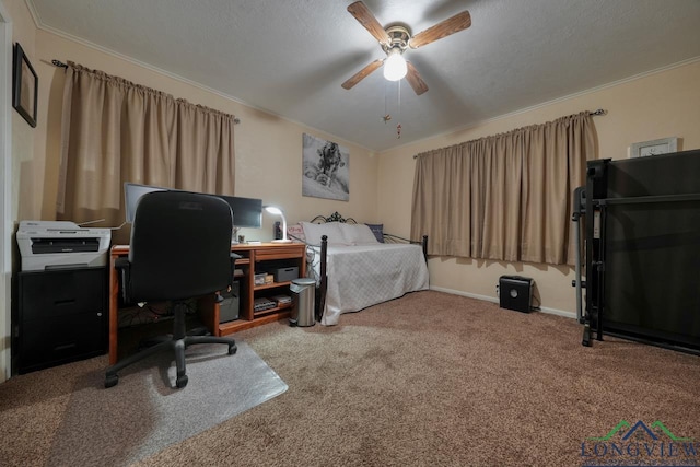 bedroom with ceiling fan, ornamental molding, a textured ceiling, and carpet