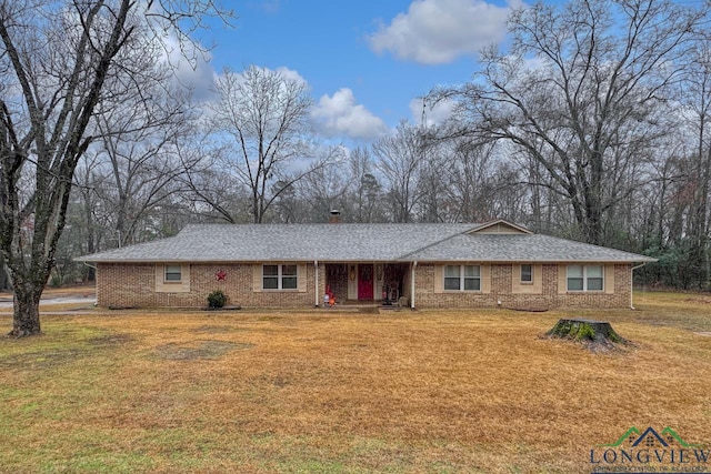 ranch-style home with a front yard