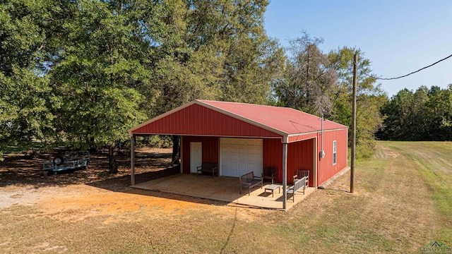 view of outdoor structure with a garage