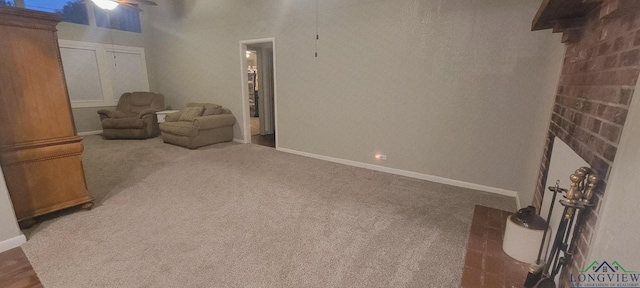 414 E Main St, Omaha, TX 75571 - carpeted living room featuring baseboards