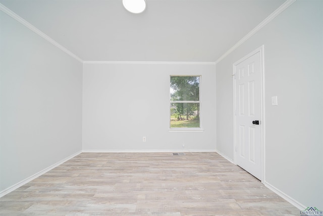 100 Dickson Ct, Kilgore, TX 75662 - empty room featuring ornamental molding, wood finished floors, and baseboards