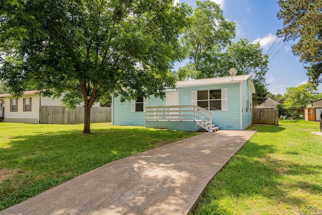 100 Dickson Ct, Kilgore, TX 75662 - view of front of house featuring metal roof