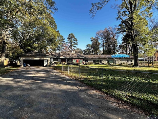 ranch-style home with a garage