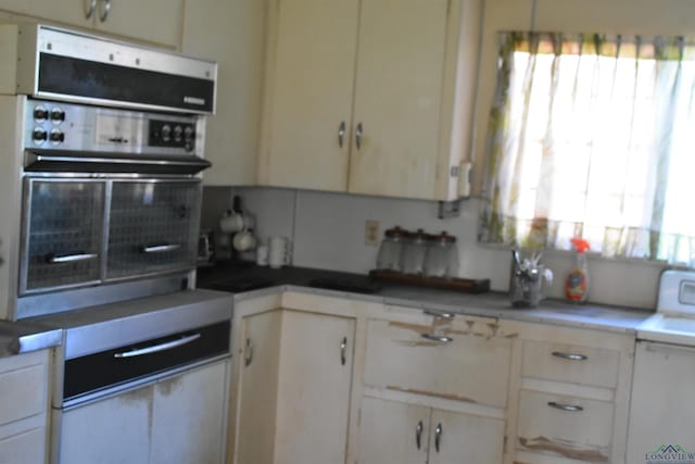 kitchen with white cabinets