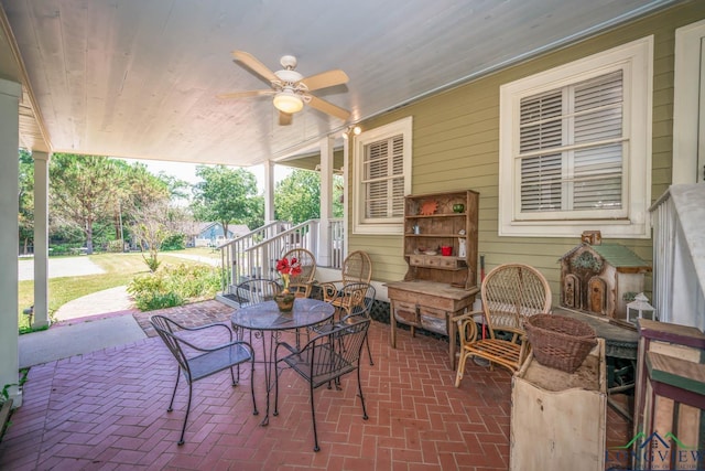 view of patio featuring ceiling fan