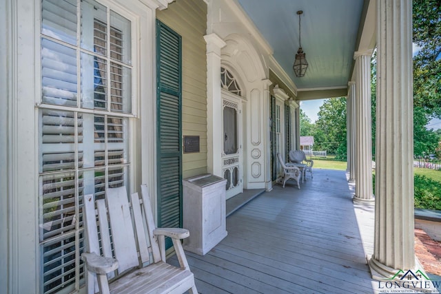 wooden terrace with covered porch