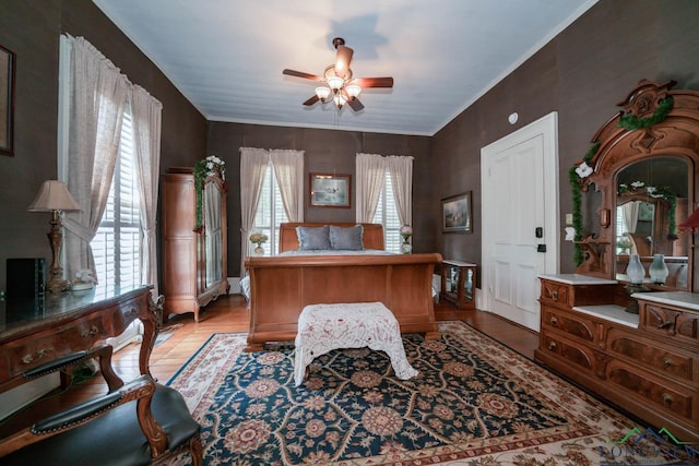 bedroom featuring ceiling fan and light wood-type flooring