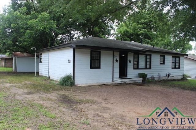 1212 N Edwards St, Gladewater, TX 75647 - view of ranch-style house