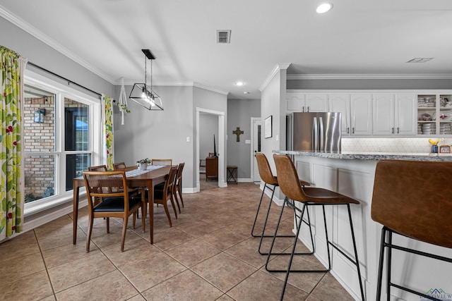 215 Sugar Creek Ln, Longview, TX 75605 - dining room featuring crown molding, light tile patterned flooring, recessed lighting, and baseboards