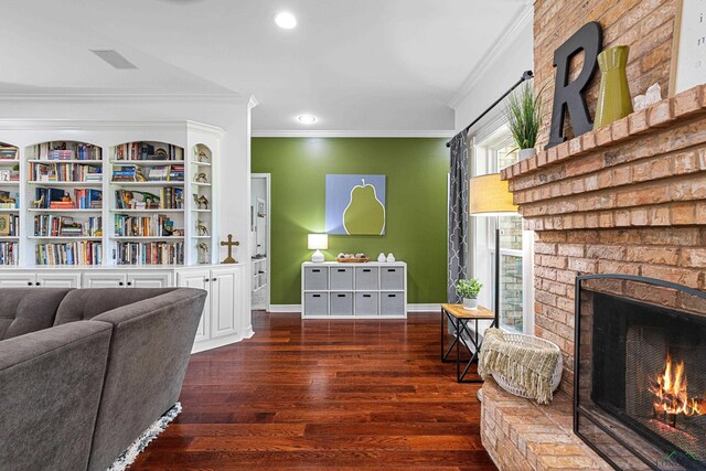 215 Sugar Creek Ln, Longview, TX 75605 - living area featuring a brick fireplace, crown molding, wood finished floors, recessed lighting, and baseboards