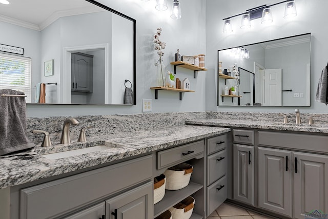 215 Sugar Creek Ln, Longview, TX 75605 - full bathroom featuring crown molding, double vanity, and tile patterned flooring