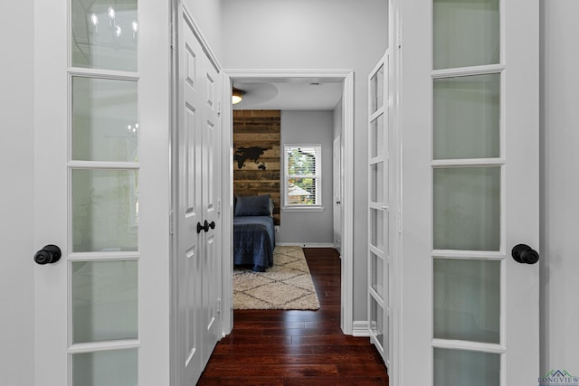 215 Sugar Creek Ln, Longview, TX 75605 - hallway with dark wood finished floors, french doors, and baseboards