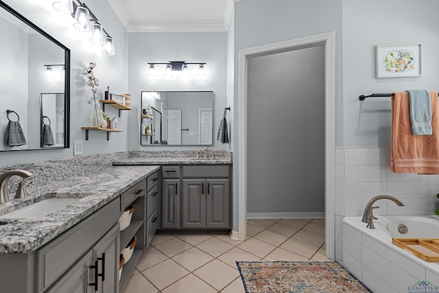 215 Sugar Creek Ln, Longview, TX 75605 - full bath featuring double vanity, ornamental molding, a garden tub, tile patterned floors, and baseboards