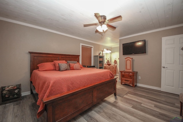 bedroom with baseboards, light wood-type flooring, ceiling fan, and ornamental molding