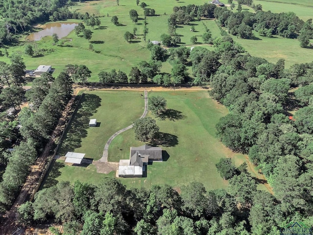 aerial view of property and surrounding area featuring rural landscape