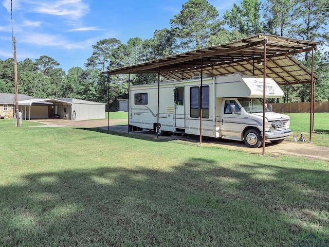 view of parking with a detached carport