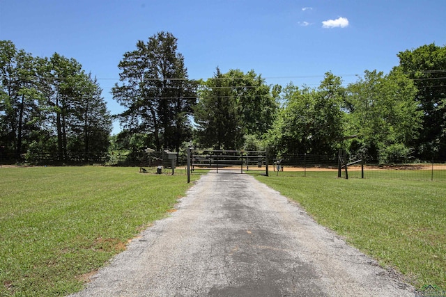 view of road with a gate