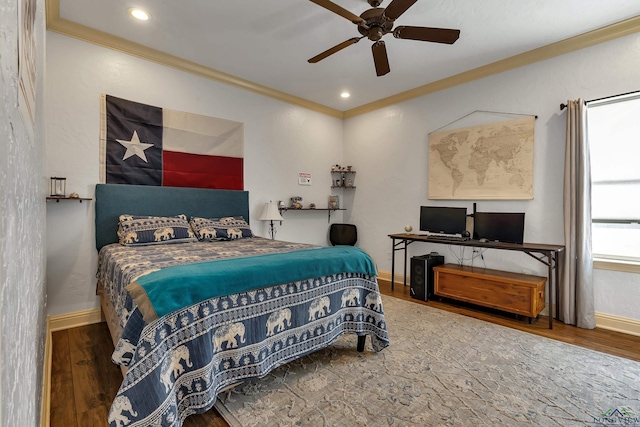 bedroom featuring ceiling fan, crown molding, and hardwood / wood-style floors