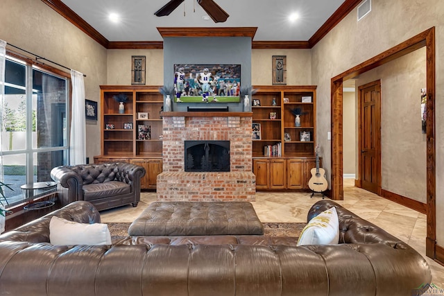 living room with ceiling fan, a brick fireplace, and crown molding