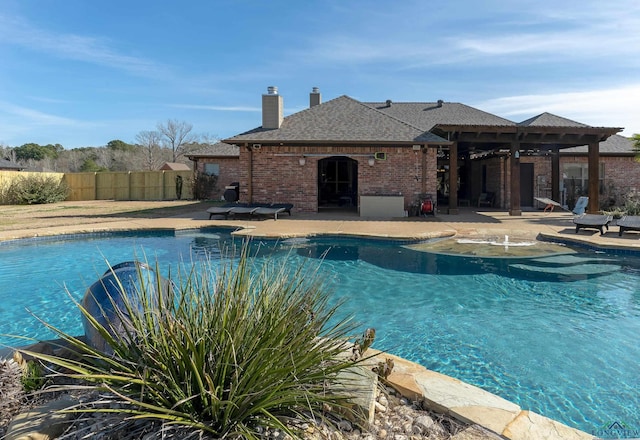 view of pool featuring a patio